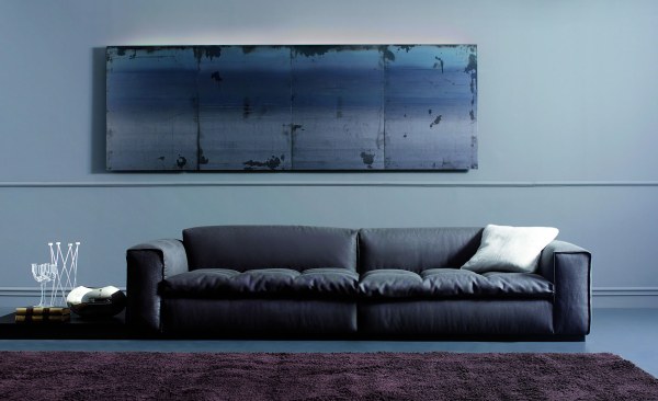 A navy modern urban-style sofa