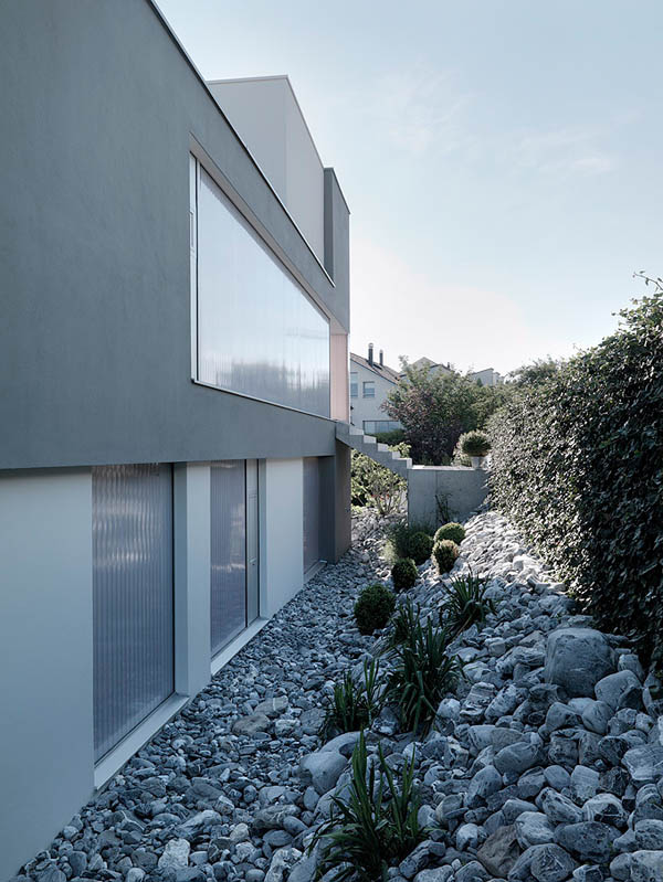 Glass Contemporary Feldbalz House - stones on the sides