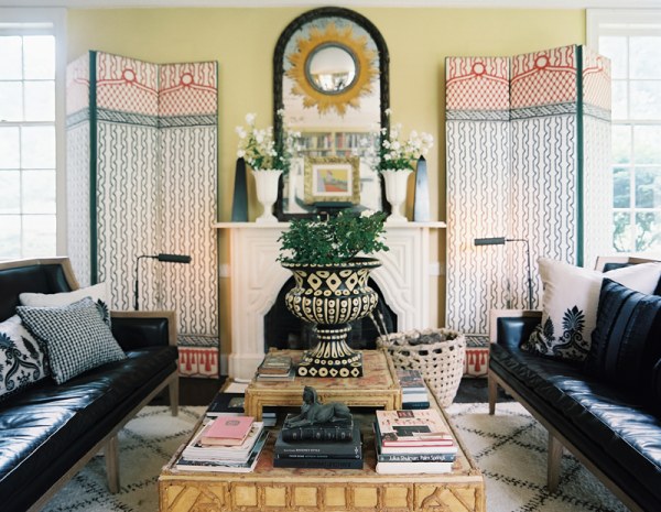Hide living room clutter with decorative screens