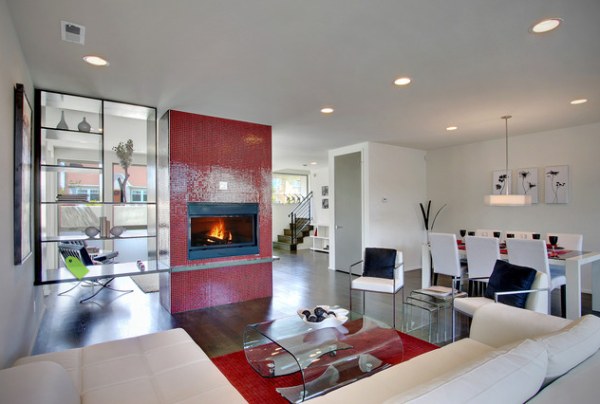 Shelving and a red-tiled fireplace define a living space