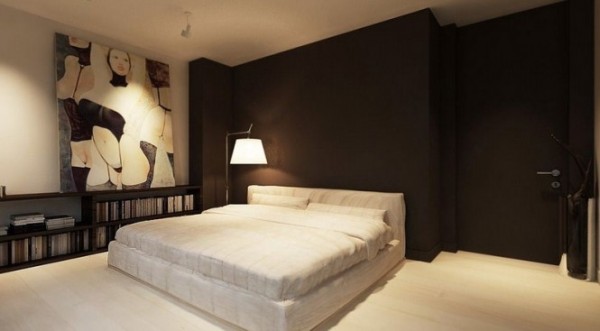 black walls bedroom with white bed and flooring