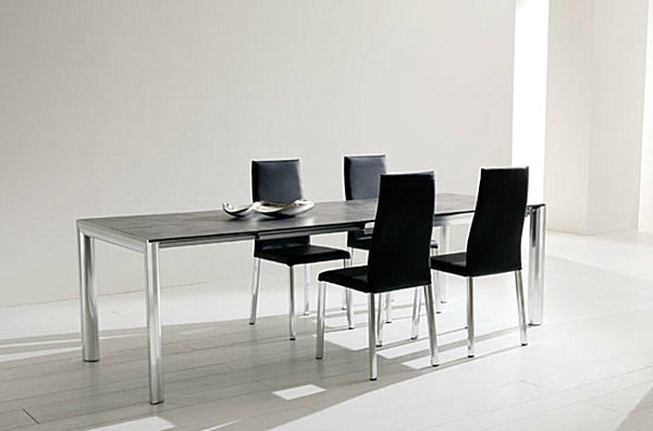 dark wooden expandable table with metal legs