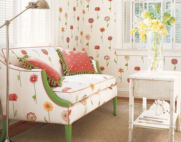 green white and red loveseat with print