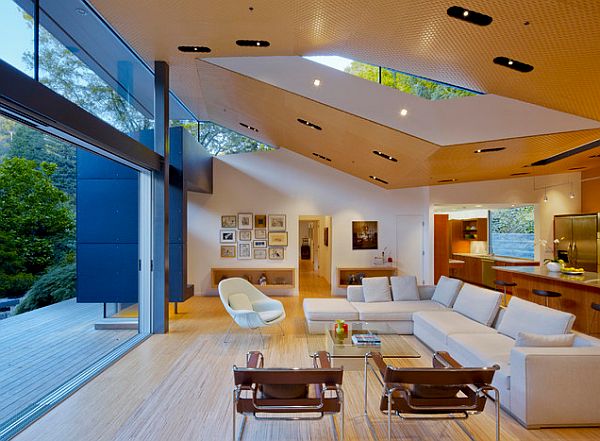 highly modern open living room design with glass wall