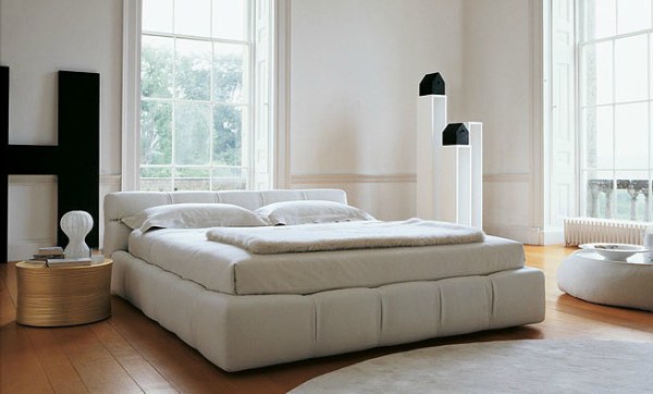 A modern Italian tufted bed