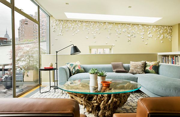 ultra contemporary living room with wood stump coffee table