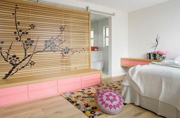 white and pink bedroom with asian floral dividing wall