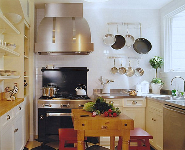 A bright kitchen with wall-mounted pots