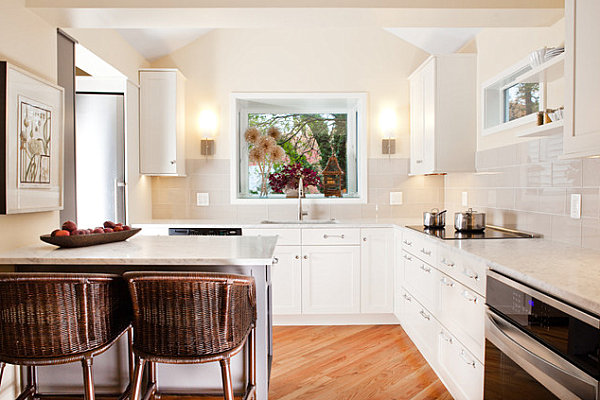 A kitchen with marble counters