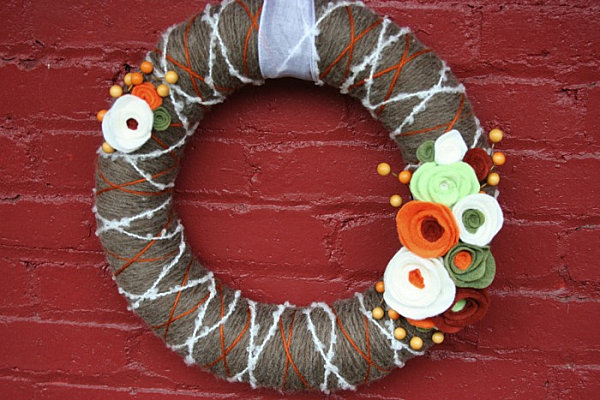 A modern yarn and felt wreath