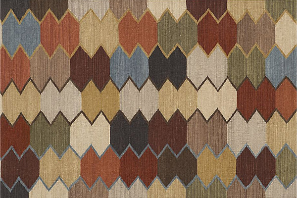 A modern geometric rug in autumn colors