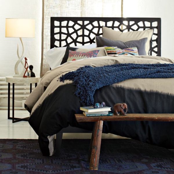 A modern wooden lacy headboard