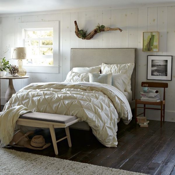 A nailhead upholstered headboard