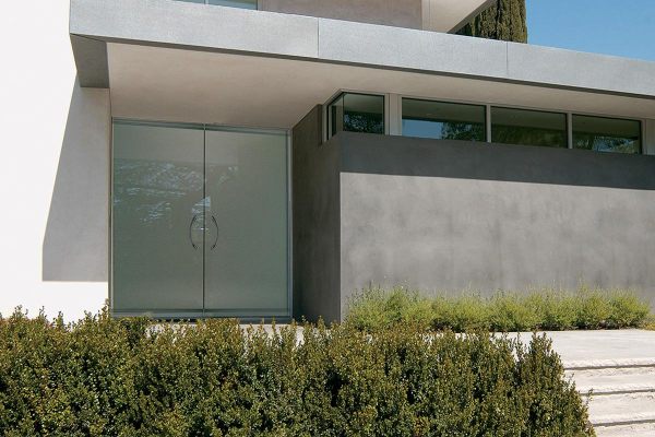 A pair of glass doors with stainless steel pulls