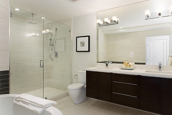 A series of square bulbs creates vanity lighting in a modern bathroom