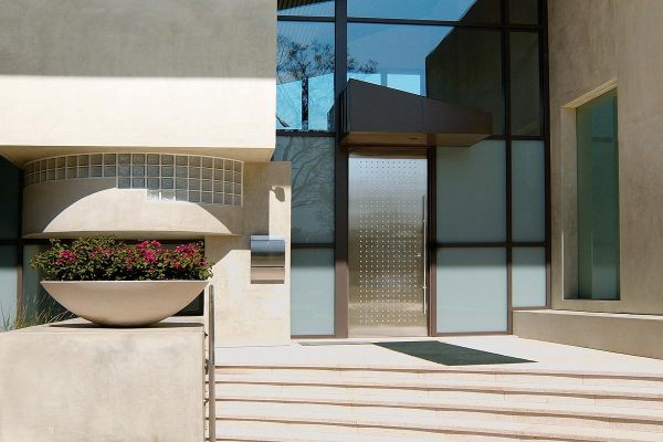 A stainless steel door with a square pattern