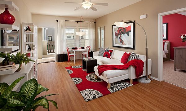 Bedroom decorating with red rugs and red pillows