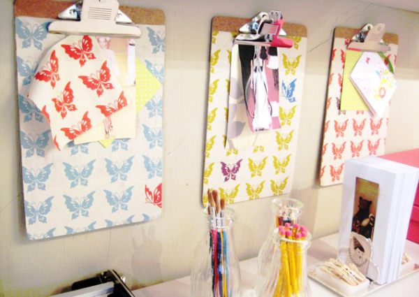 Clipboards secure fabric and pictures in a home office