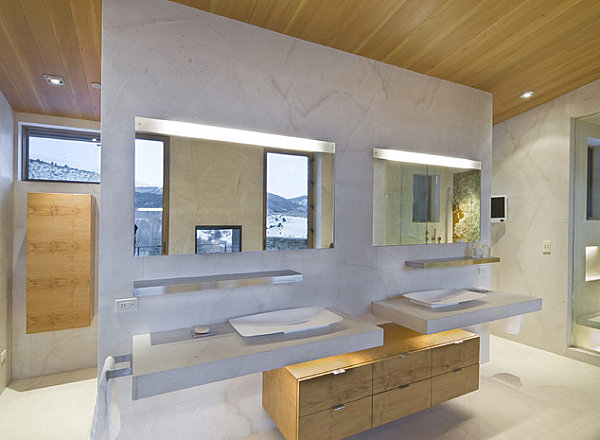 LED strip lighting above the sinks in a modern bathroom