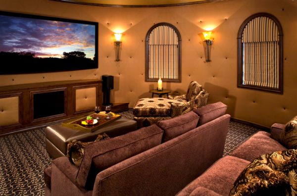 Mediterranean Theater Room with Unique Round Walls