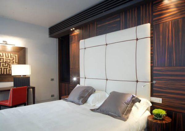 Recessed lighting over a hotel bed