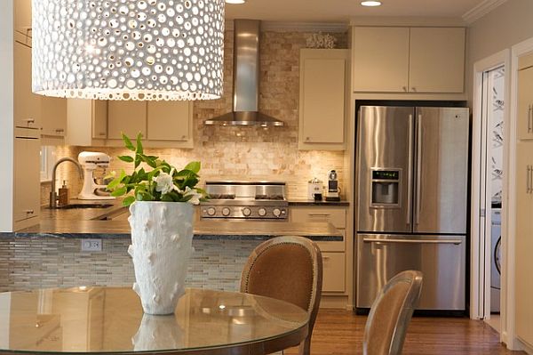 Stylish dining room with large lighting fixture