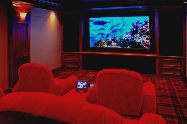 Ultra Modern Compact Media Room with Red and Blue accents