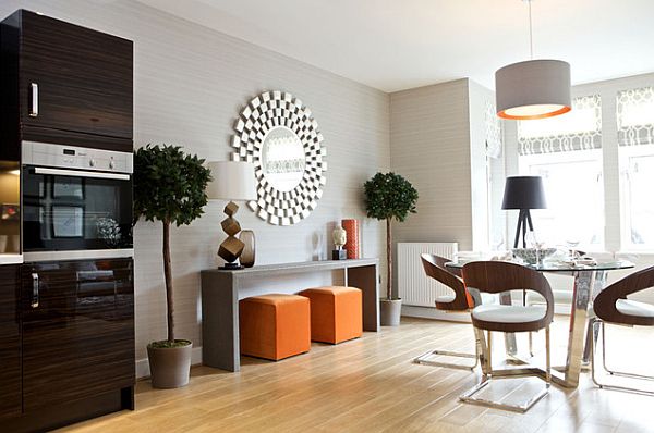 modern living room furniture and a sunburst mirror