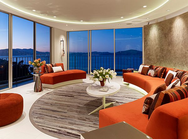 round living room with orange round sofa