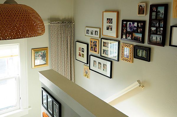 showcasing family pictures in your staircase hallway