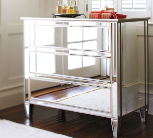 A 3-drawer mirrored dresser