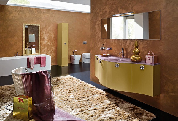 A bathroom in shades of gold, bronze and rose