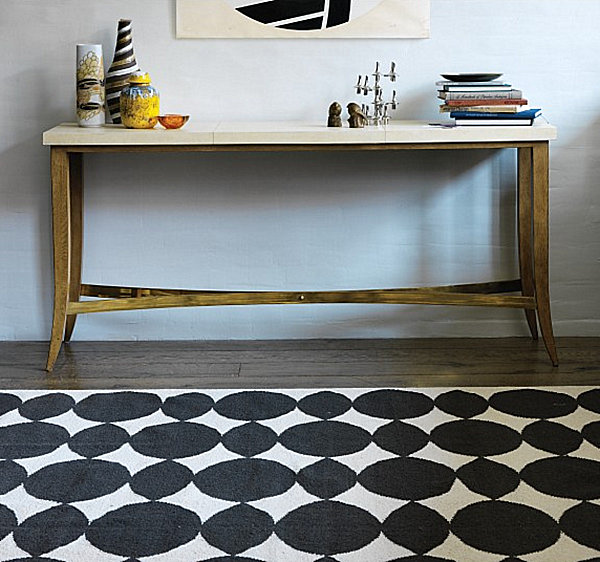 A dotted rug in a modern entryway