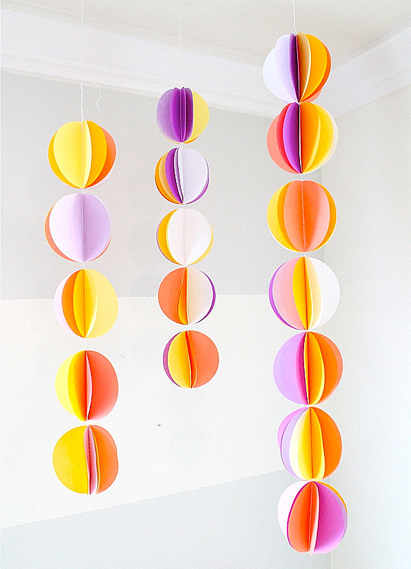 A paper ball garland in bright colors