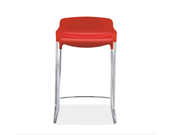 A red plastic stool