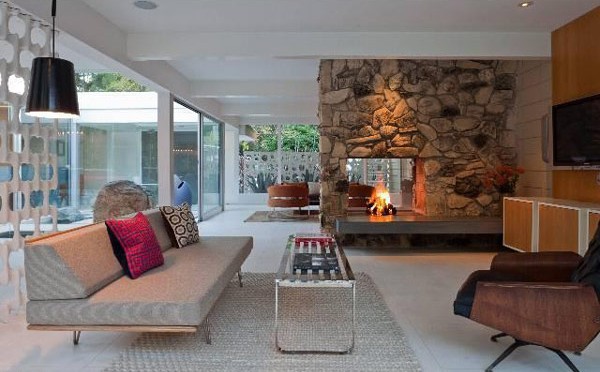 Attractive-stone-fireplace-in-large-living-room
