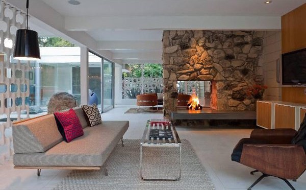 Attractive stone fireplace in large living room