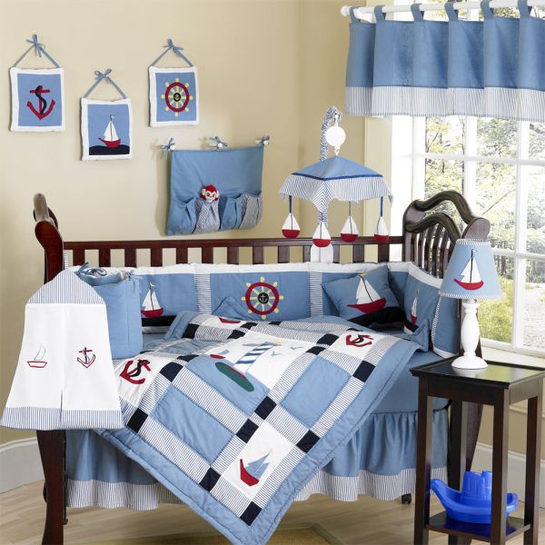 Beautiful blue Come Sail Away baby bedding set with a nautical theme