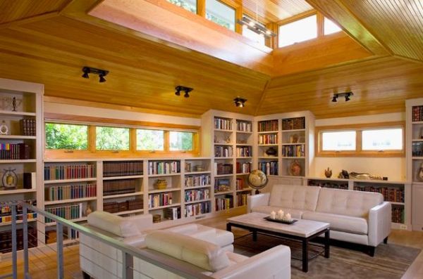 Beautifulnatural wood and ample natural lighting accompany this Home Library