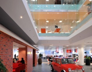 Morgan Lovell Paints the New Rackspace Office Red, With Flamboyant British-flavored Design!