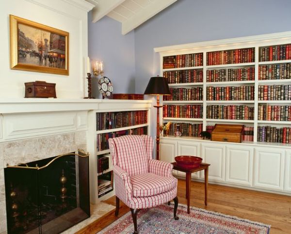 Classic-home-library-with-rope-lighting-and-next-to-a-fireplace