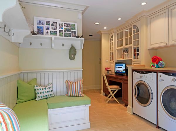 Classy laundry room that also houses a daft work station