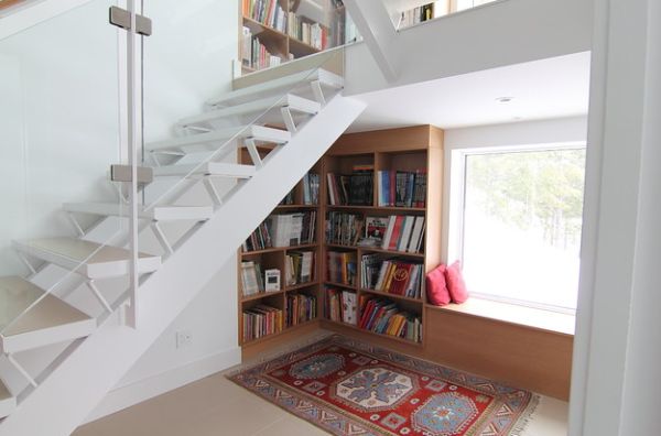 Cleanly designed bookcase under the stairs