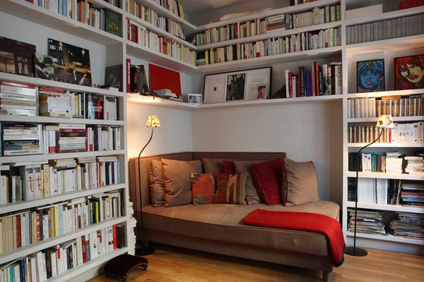 Cozy-and-comfortable-couch-at-the-heart-of-innovative-home-library