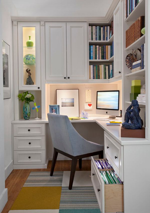 Custom crafted wooden home office area with glass shelves