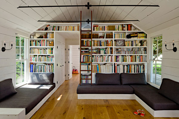 Delightful home library unit comes with a spot to perch at the top