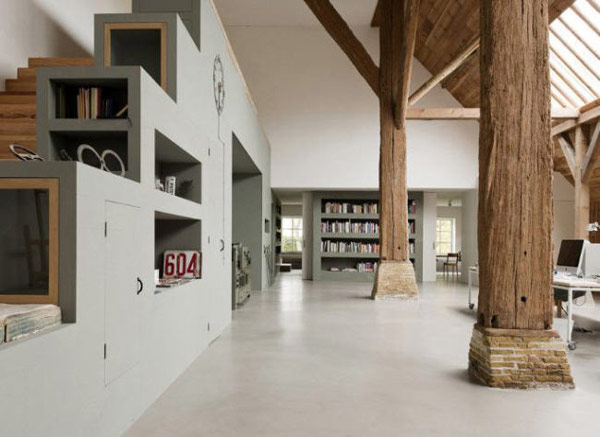 Elegant shelf space designed parallel to the stairs