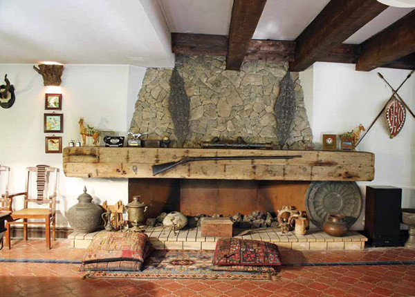 Fireplace laced with antiques and collectables