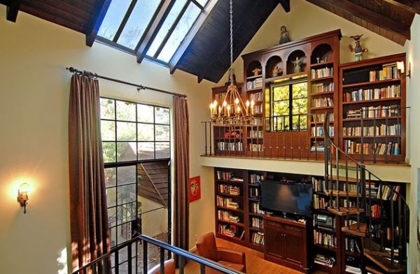 Home library with a beautiful circular staircase