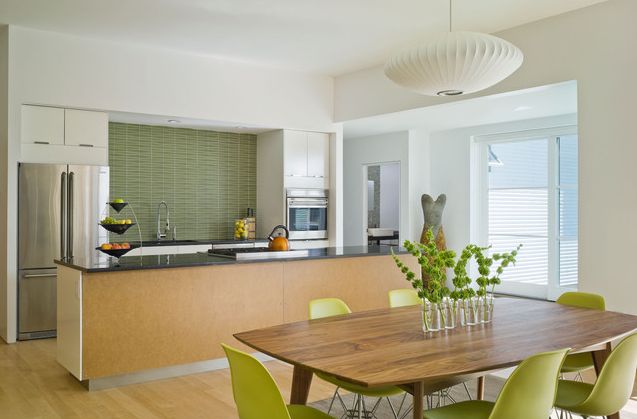 Light neutral kitchen with colorful finish materials